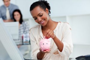 Woman and piggy bank