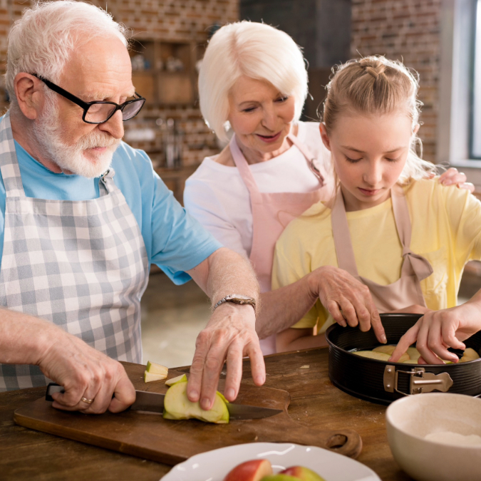 grandparents cooking with grandchild