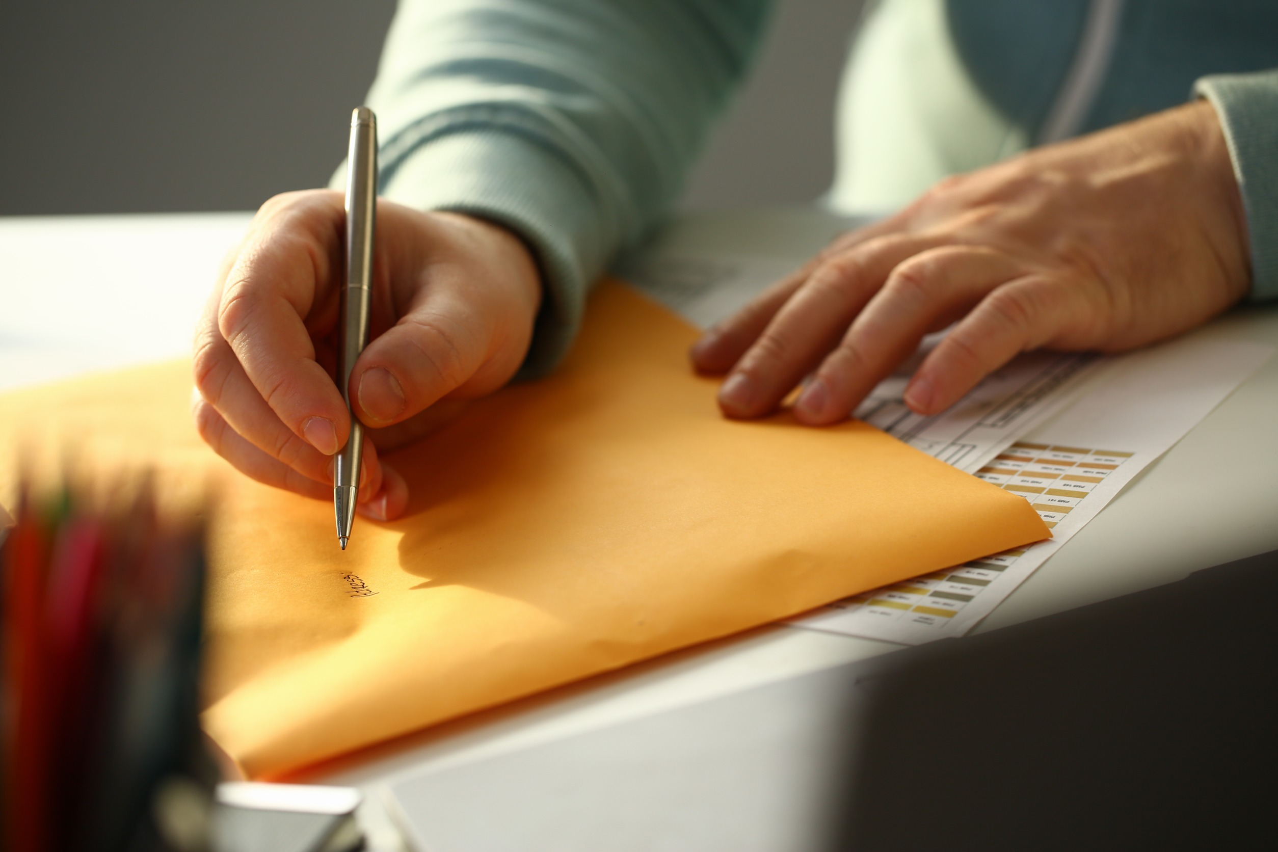 cash stuffing writing on envelope