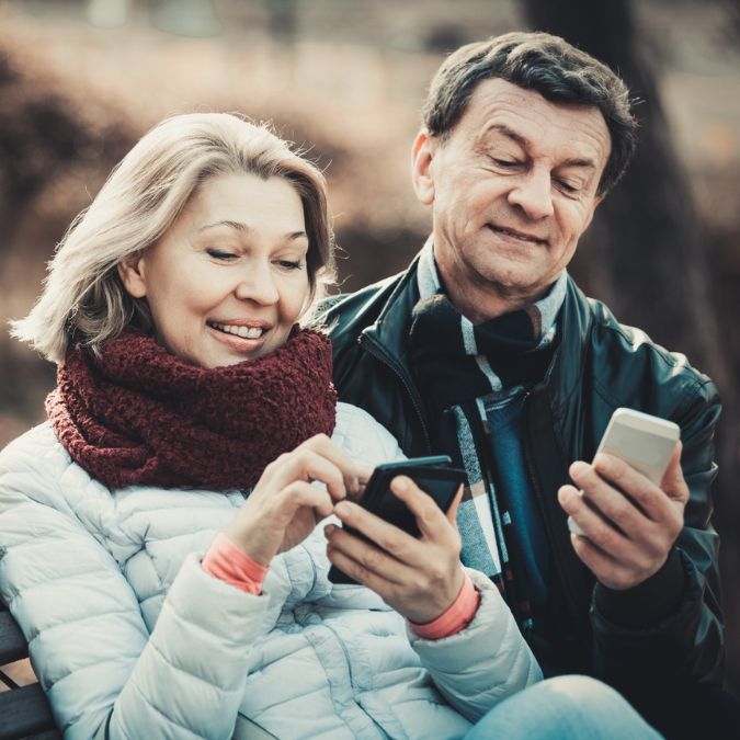 a couple using cellphone