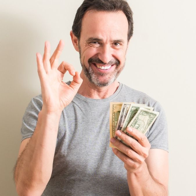 a man holding money