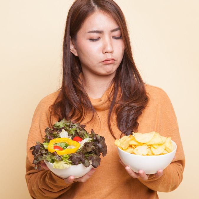 woman holding food