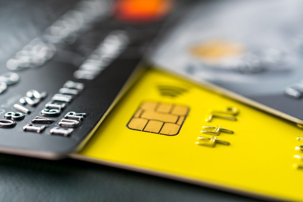 Close-up shot of a debit or credit plastic cards.