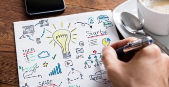 Person Drawing Lightbulb Ideas Concept On White Paper