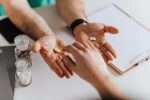 handing out pills