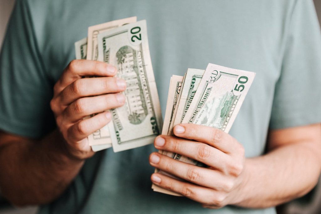 man holding money