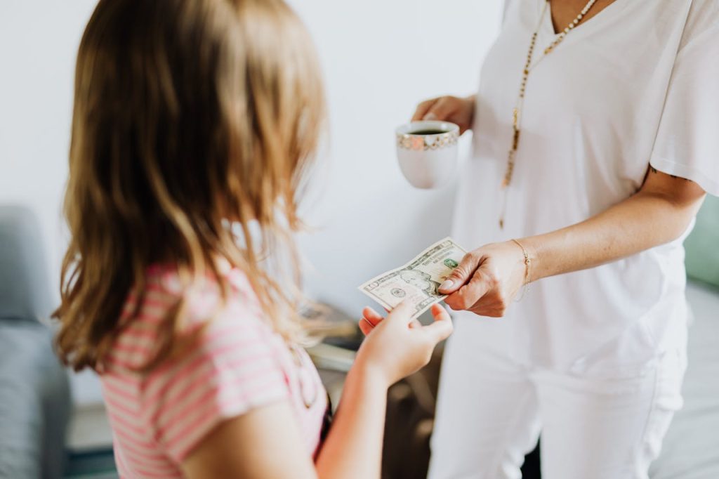 handing a kid money