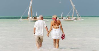 retirement couple on the beach